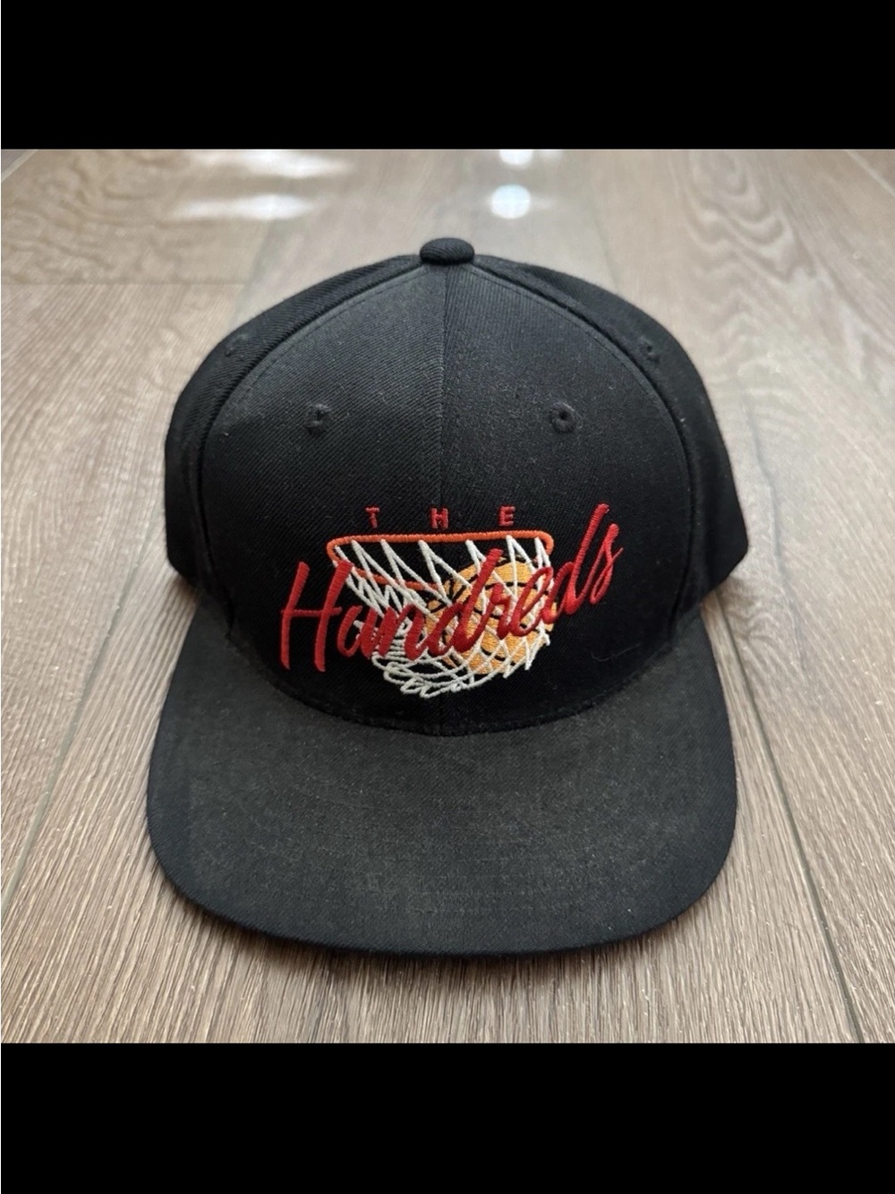 The Hundreds Black Snapback Hat with Red and White Hoop Embroidery